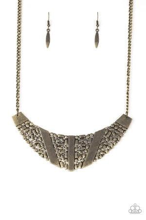 Paparazzi Accessories Terra Trailbreaker - Brass Varying in shape, a collection of dainty brass frames coalesce into a striking crescent pendant below the collar for a statement making look. Features an adjustable clasp closure. Sold as one individual nec
