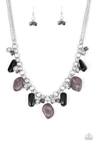 Paparazzi Accessories Grand Canyon Grotto - Black Featuring polished and cloudy finishes, a collection of black faux rocks dance from the bottom of a bold silver chain. Classic silver beads trickle between the colorful beading, adding a metallic shimmer t