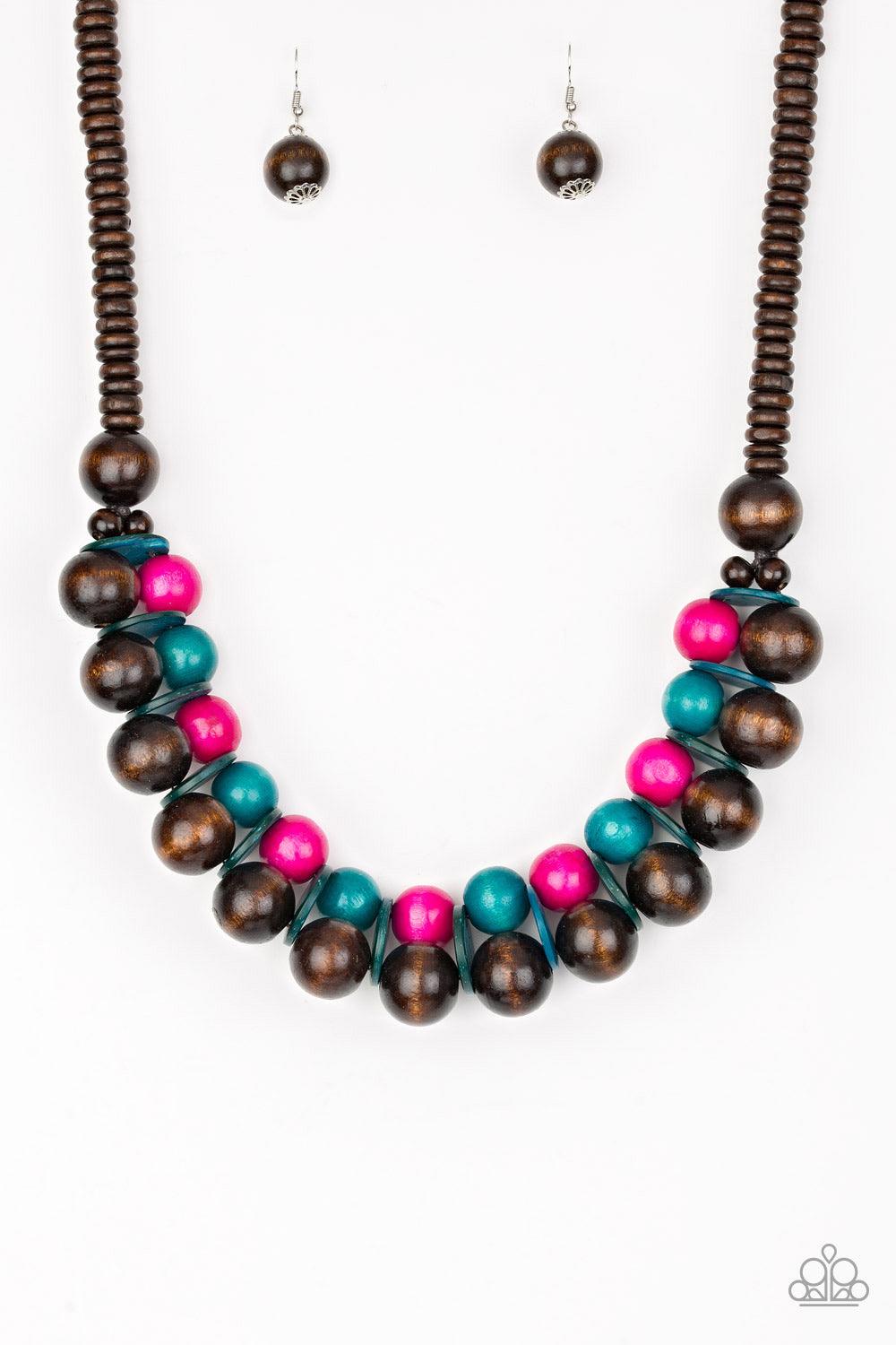 Paparazzi Accessories Caribbean Cover Girl - Multi Brushed in a distressed finish, vivacious pink and blue wooden beads and discs join below the collar for a summery look. Features a button loop closure. Jewelry