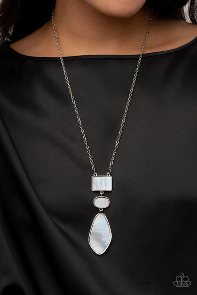 Paparazzi Accessories Hidden Cove - Silver Featuring an iridescent shimmer, rectangular, oval, and asymmetrical gray shell-like accents link from the bottom of an extended silver chain for a beach inspired fashion. Features an adjustable clasp closure. So