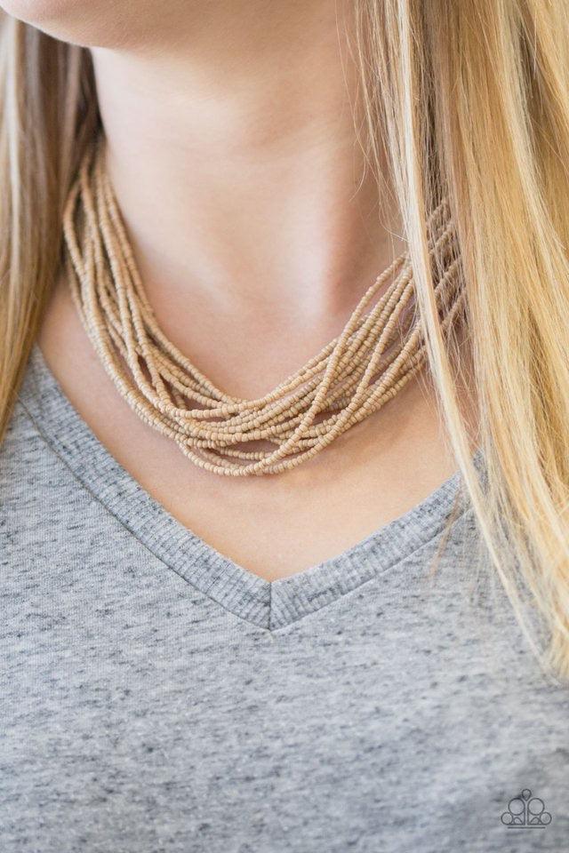 Paparazzi Accessories Wide Open Spaces ~Brown nfused with two large silver fittings, neutral brown seed beads are threaded along countless strands, creating dramatic layers below the collar for a seasonal look. Features an adjustable clasp closure. Sold a