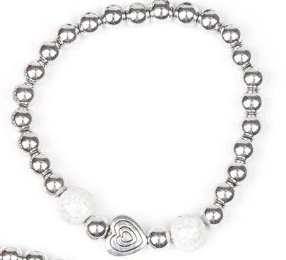 Paparazzi Accessories Starlet Shimmer Bracelet #13 - White Featuring silver heart charms, with a glassy colored bead. Jewelry