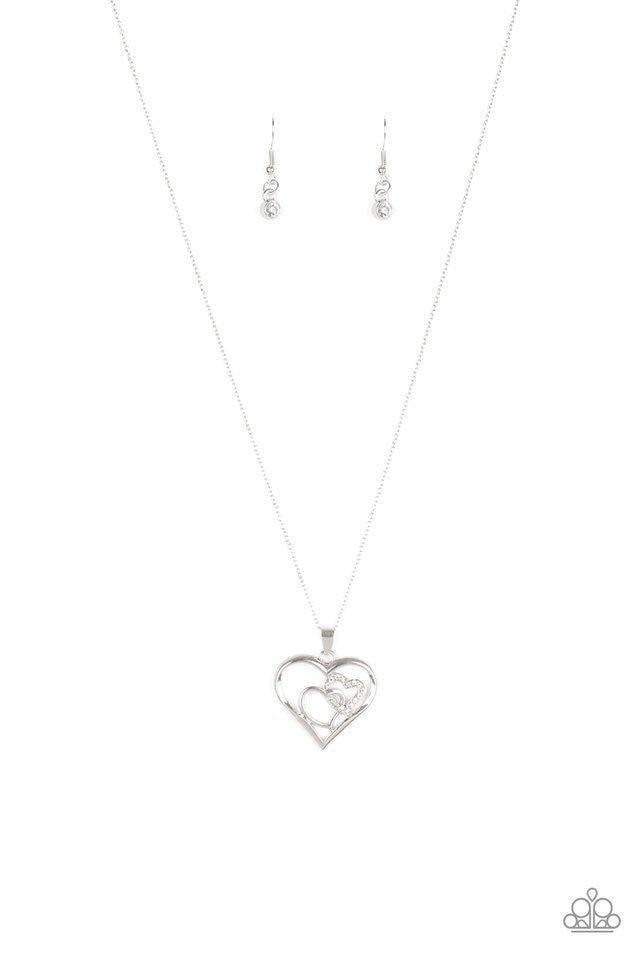 Paparazzi Accessories Cupid Charm - White A white rhinestone encrusted heart intertwines with a plain silver heart inside of a larger silver heart frame, creating a romantic pendant at the bottom of a shimmery silver chain. Features an adjustable clasp cl