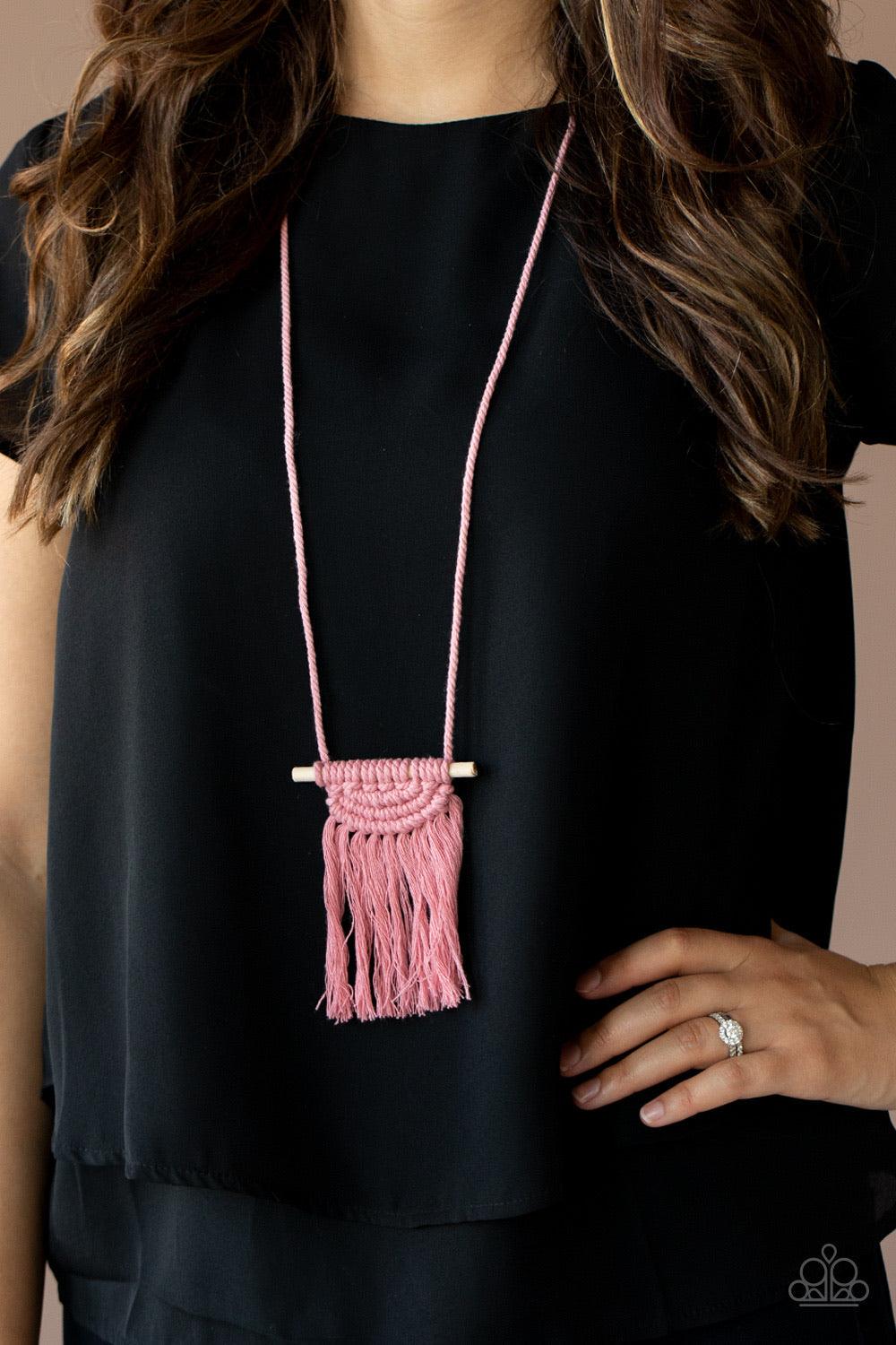 Paparazzi Accessories Between You And MACRAME -Pink Rose Tan cording delicately wraps around a dainty wooden dowel, knotting into a tasseled macramé centerpiece at the bottom of a dramatically lengthened display. Features an adjustable sliding knot closur