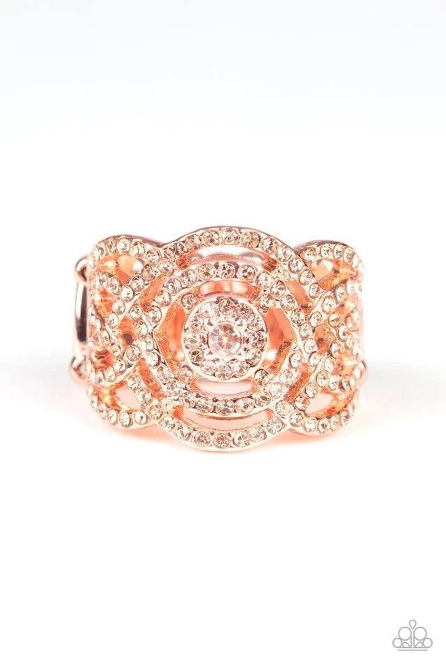 Paparazzi Accessories COUNTESS To-Ten - Copper Dotted in dainty peach rhinestones, dainty shiny copper bands swirl and whirl across the finger, coalescing into a refined frame. Features a stretchy band for a flexible fit. Sold as one individual ring. Jewe