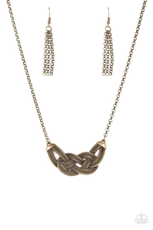 Paparazzi Accessories Nautically Naples - Brass Featuring chain-like patterns, antiqued brass bars knot below the collar for a bold industrial look. Features an adjustable clasp closure. Sold as one individual necklace. Includes one pair of matching earri
