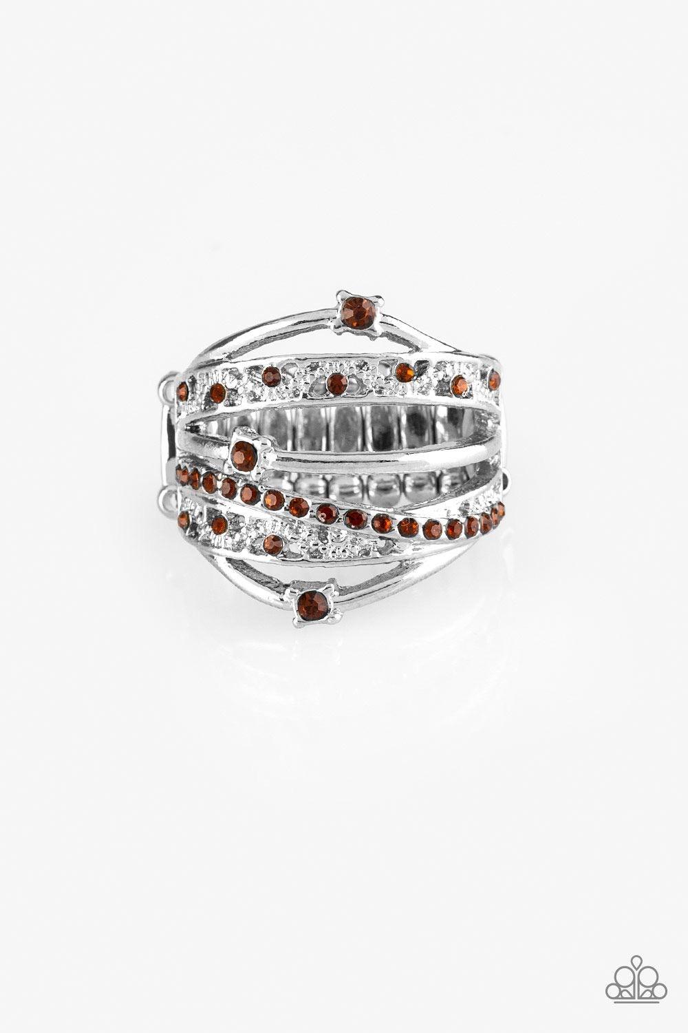 Paparazzi Accessories Making The World Sparkle - Brown Mismatched silver bands arc across the finger, coalescing into an airy frame. Dainty rhinestones are sporadically sprinkled across the shimmery layers for a refined finish. Features a stretchy band fo