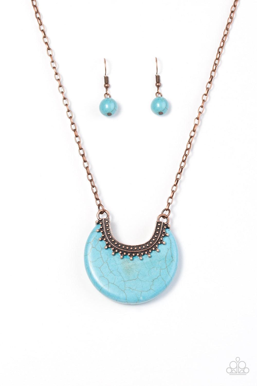 Paparazzi Accessories Mesa Moon - Cooper Chiseled into an earthy crescent, a refreshing turquoise stone attaches to a studded copper frame, creating a bold artisanal pendant. Features an adjustable clasp closure. Jewelry