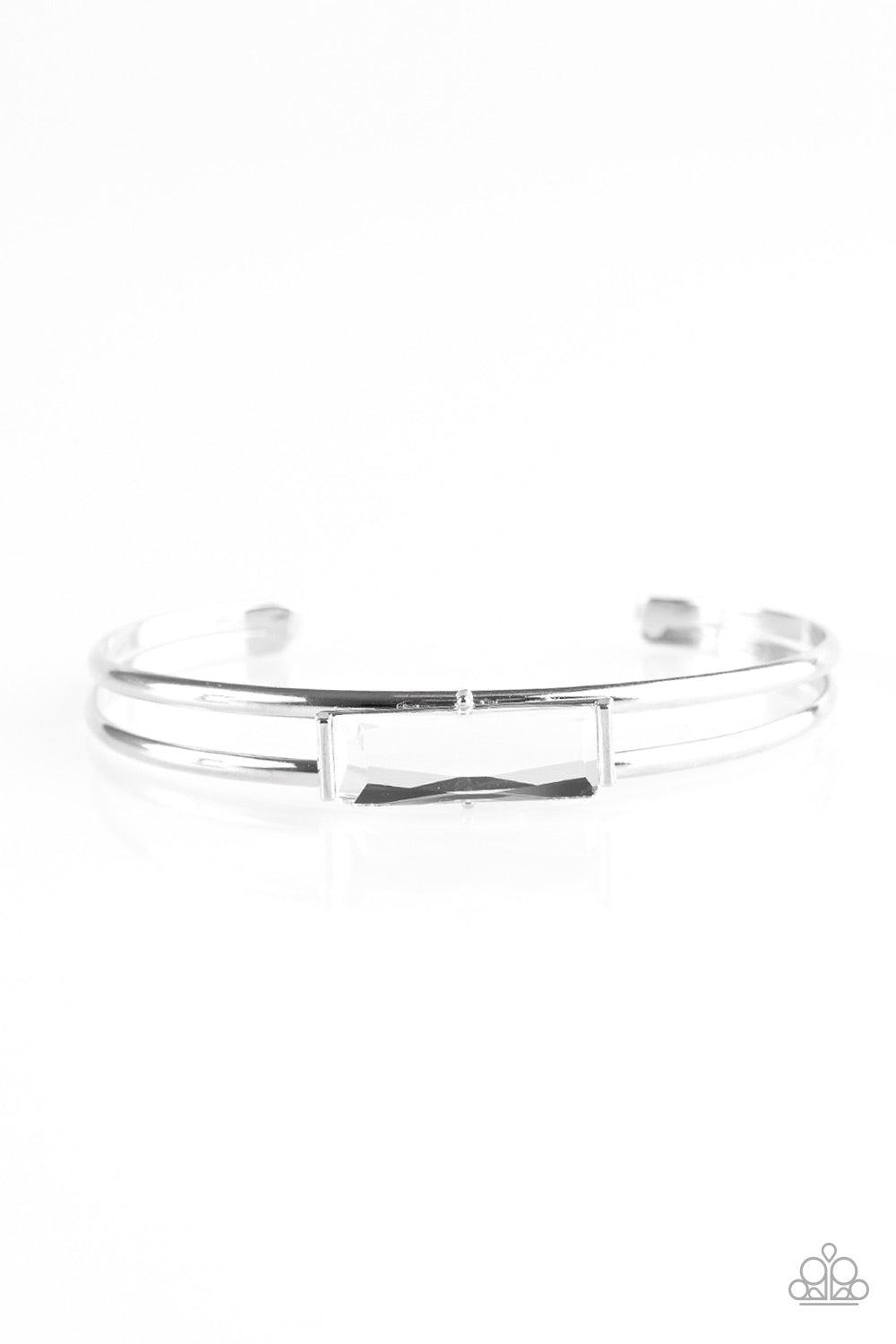Paparazzi Accessories Choose Chic - White Featuring an elegant emerald style cut, a glassy white gem is pressed into the center of a dainty silver cuff for a regal look. Jewelry