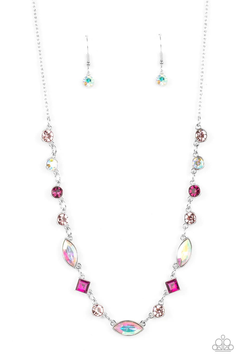 Paparazzi Accessories Irresistible HEIR-idescene - Pink Varying in geometric shapes and shades of pink, glittery rose and fuchsia gems are sprinkled between iridescent rhinestone accents for a dreamy refined, and irresistible finish. Features an adjustabl