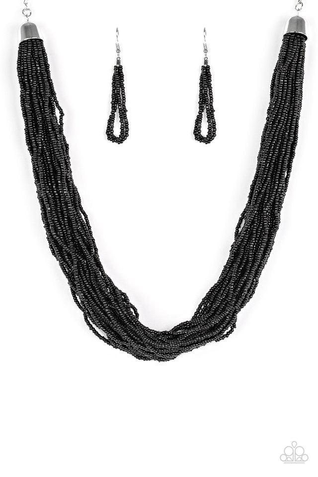 Paparazzi Accessories The Show Must CONGO On! - Black Infused with two bold silver fittings, countless strands of black seed beads drape below the collar for a seasonal look. Features an adjustable clasp closure. Sold as one individual necklace. Includes