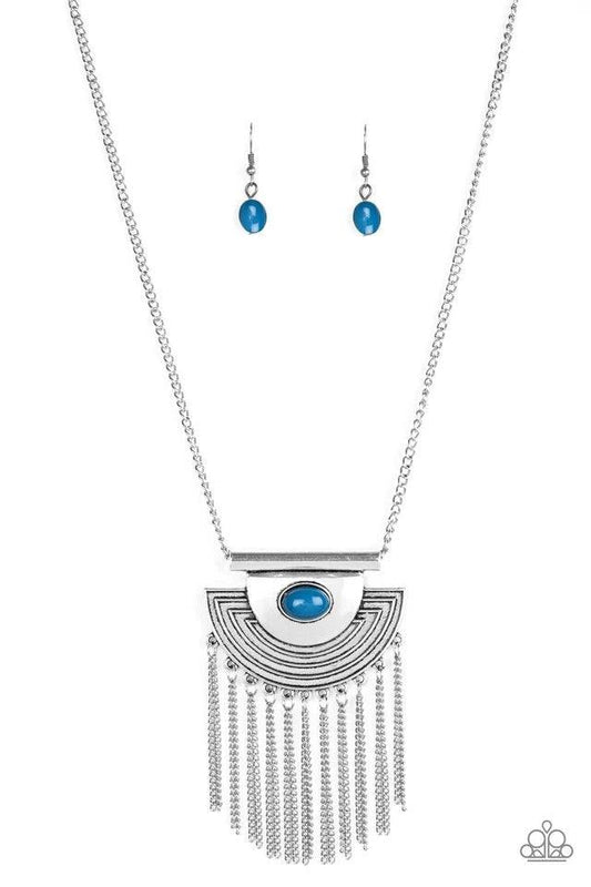 Paparazzi Accessories When in Roam - Blue A refreshing blue bead is pressed into the center of an antiqued silver crescent shaped pendant radiating with geometric patterns. Antiqued silver tassels swing from the bottom of a bold pendant, creating a fierce