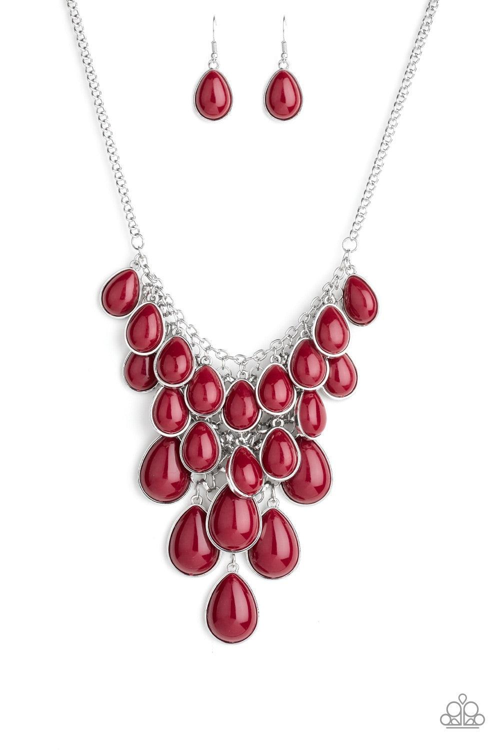 Paparazzi Accessories Shop Til You TEARDROP - Red Tinted in the classic rich hue of Wine, polished red teardrops gradually increase in size as they trickle along rows of interconnected mesh chain. The robust beads drip into a tapered shape, creating a dra