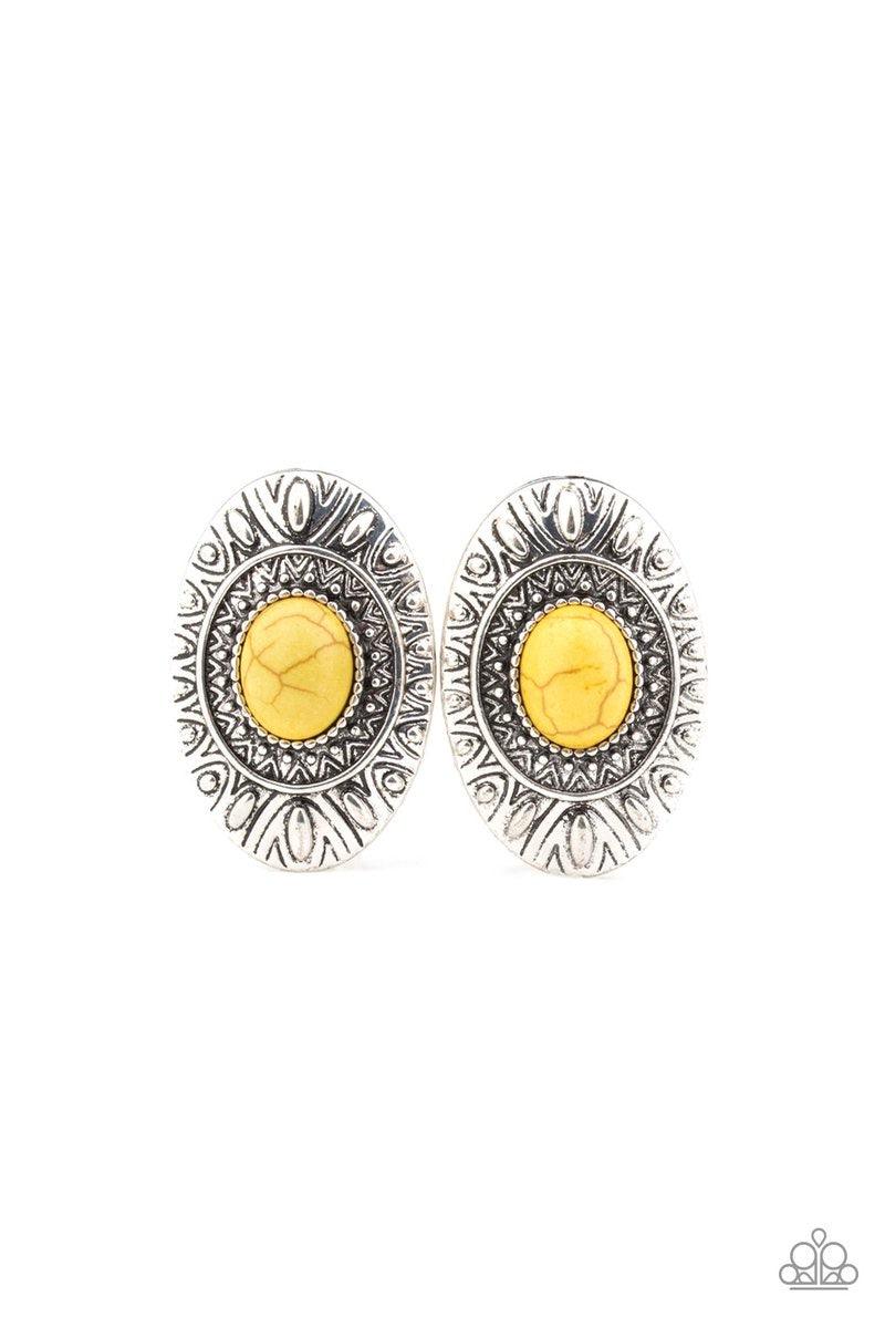 Paparazzi Accessories Stone Tiki - Yellow A sunny yellow stone is pressed into the center of an ornate silver frame radiating with sunburst and studded patterns for a tribal inspired look. Earring attaches to a standard post fitting. Jewelry