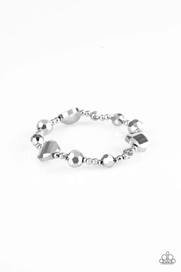 Paparazzi Accessories Starry-Eyed Elegance - Silver A collection of glittery hematite beads and shiny silver beads are threaded along a stretchy band around the wrist for a refined look. Sold as one individual bracelet. Jewelry