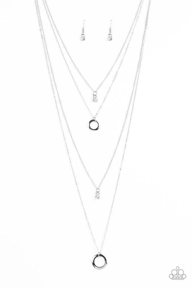 Paparazzi Accessories All About Elegance - White Glittery white rhinestones alternate with glistening silver hoops down the chest, creating refined layers. Features an adjustable clasp closure. Sold as one individual necklace. Includes one pair of matchin