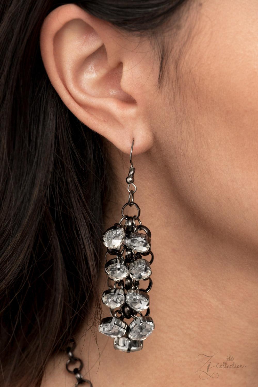 Paparazzi Accessories Ambitious 💗💗ZiCollection $25💗💗 A modern mashup of round, teardrop, and emerald cut white rhinestones link into jam-packed rows of jaw-dropping radiance. Attached to an interconnected gunmetal mesh backdrop, the clustered fringe f