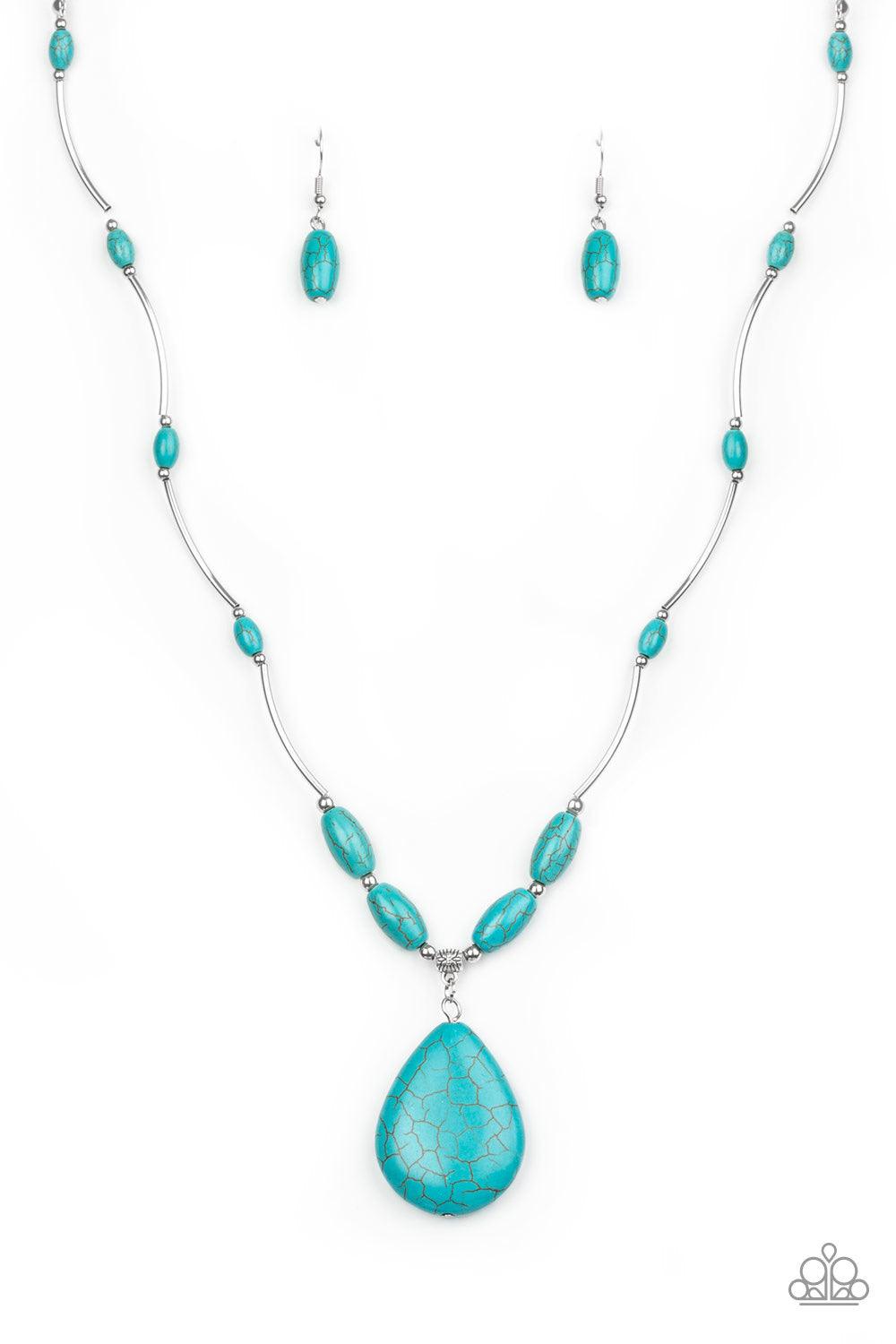 Paparazzi Accessories Explore the Elements - Blue A collection of shiny silver beads and refreshing turquoise stone beads are threaded along an invisible wire below the collar. A dramatically oversized turquoise teardrop pendant swings from the bottom of