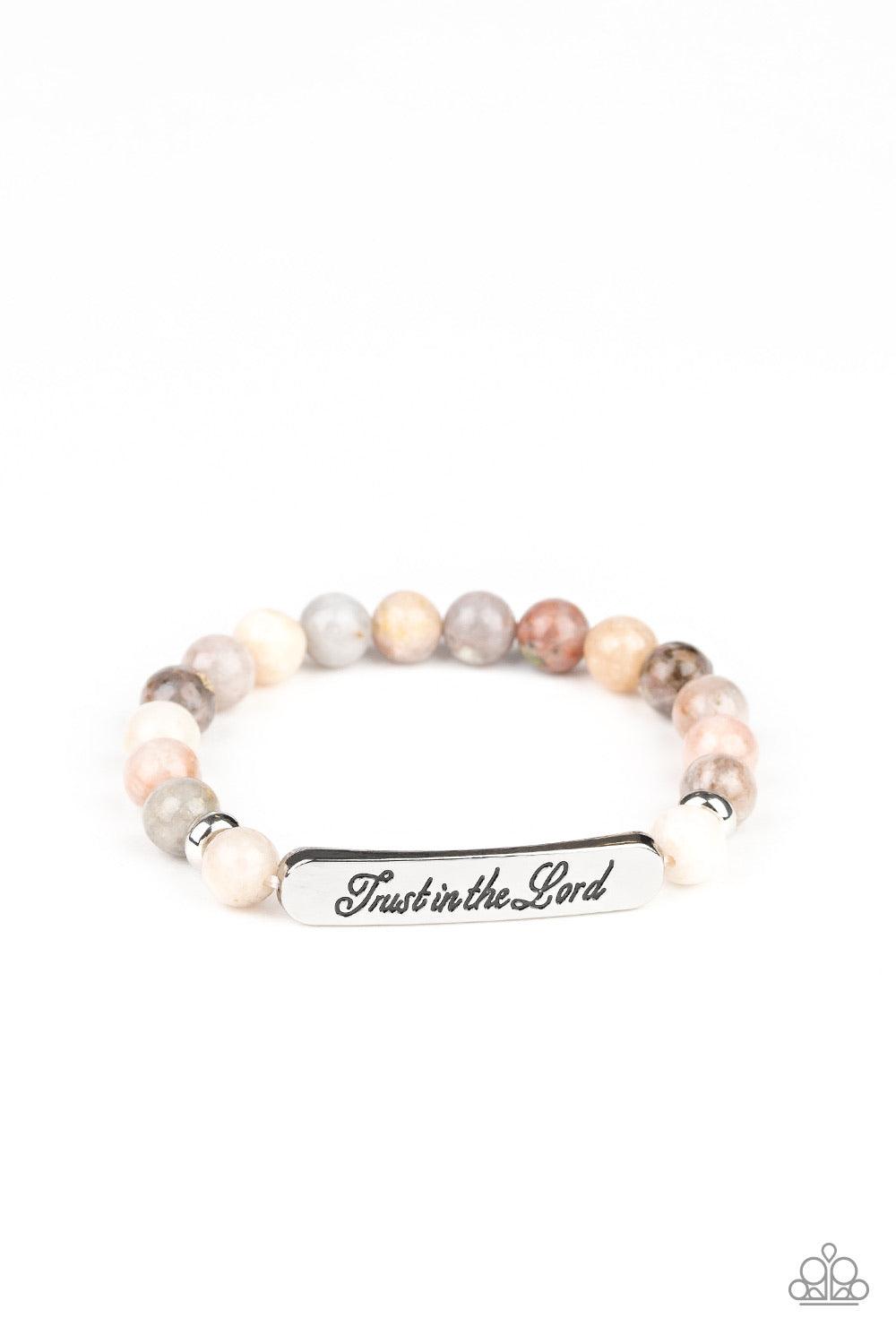 Paparazzi Accessories Keep The Trust - Multi Infused with dainty silver accents, a collection of glassy stone beads and a shimmery silver frame stamped in the phrase, "Trust in the Lord", are threaded along a stretchy band around the wrist for an inspirat