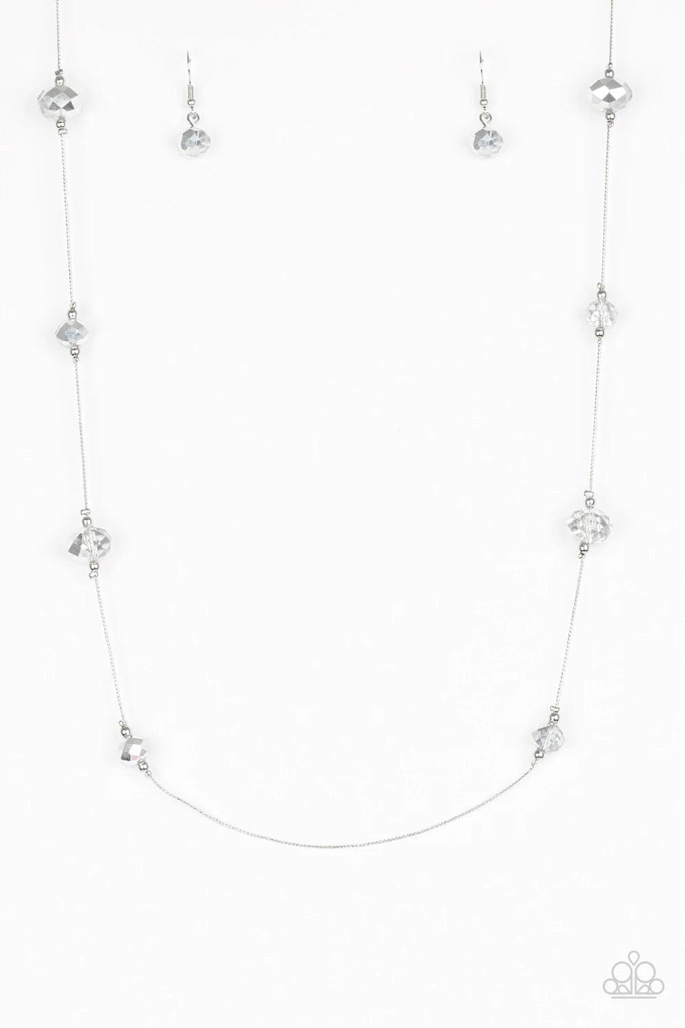 Paparazzi Accessories Champagne On The Rocks - Silver Infused with dainty silver accents, metallic and smoky crystal-like beads trickle along a dainty silver chain across the chest for a refined look. Features an adjustable clasp closure.Sold as one indiv