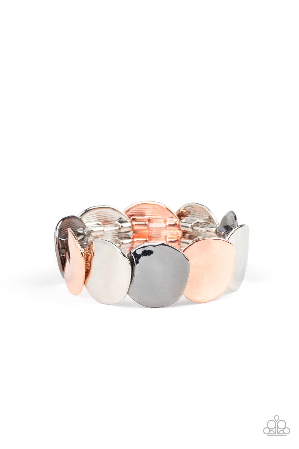 Paparazzi Accessories Disc Disco - Multi A hammered collection of asymmetrical hammered silver, shiny copper, and gunmetal discs are threaded along stretchy bands, overlapping around the wrist for a refined flair. Sold as one individual bracelet. Jewelry