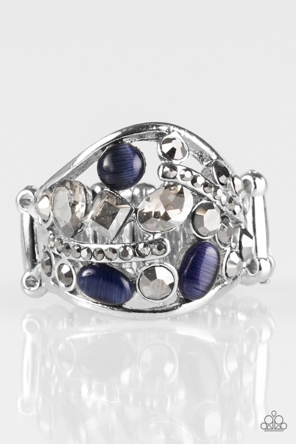 Paparazzi Accessories Let There Be STARLIGHT - Blue Dainty blue moonstones and an array of glittery rhinestones are sprinkled across a round frame, creating a collision of shimmer and sparkle. Features a stretchy band for a flexible fit. Jewelry