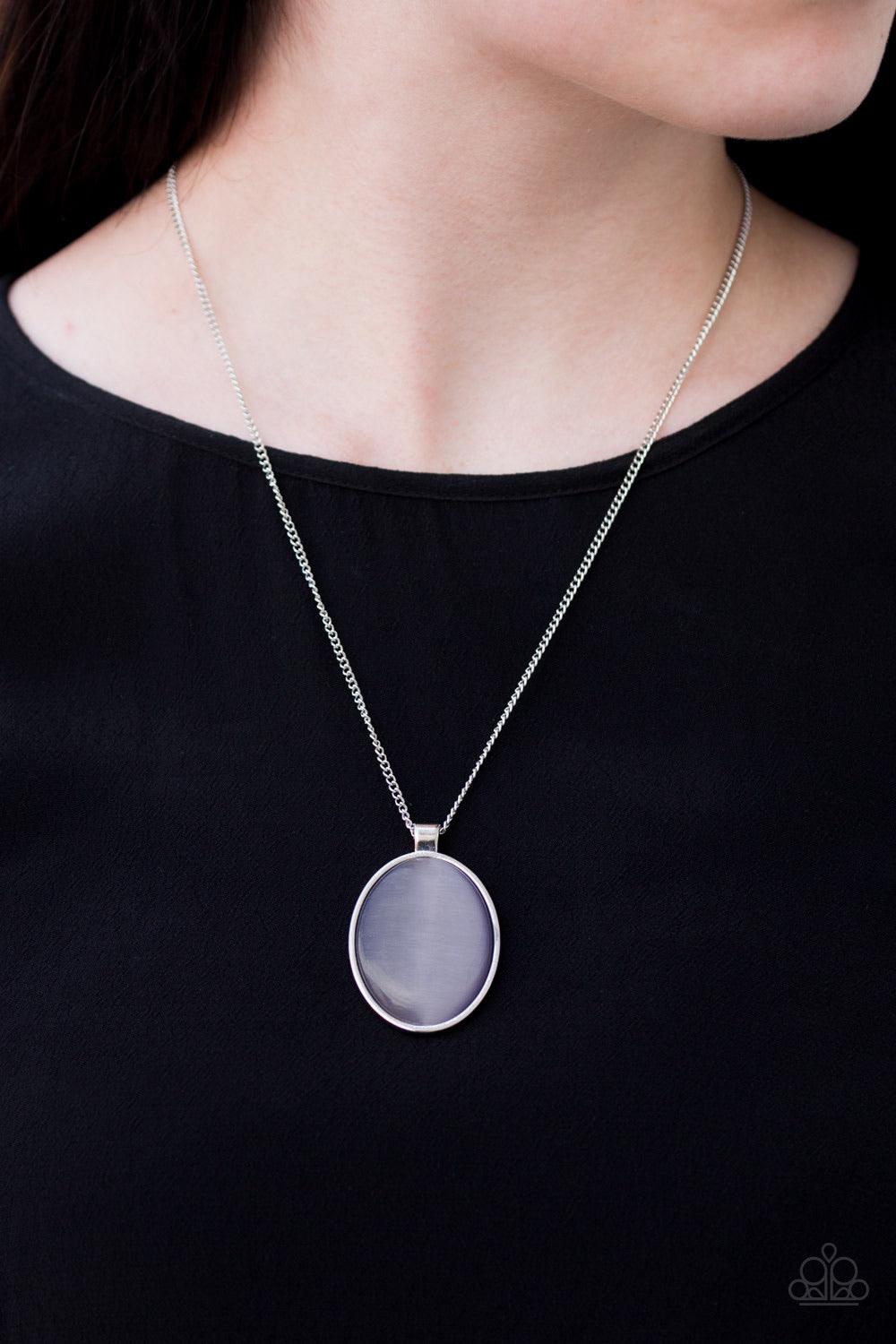 Paparazzi Accessories Pretty Poppin - Purple Pressed into a sleek silver frame, an oversized purple moonstone pendant swings below the collar for a whimsical look. Features an adjustable clasp closure. Jewelry