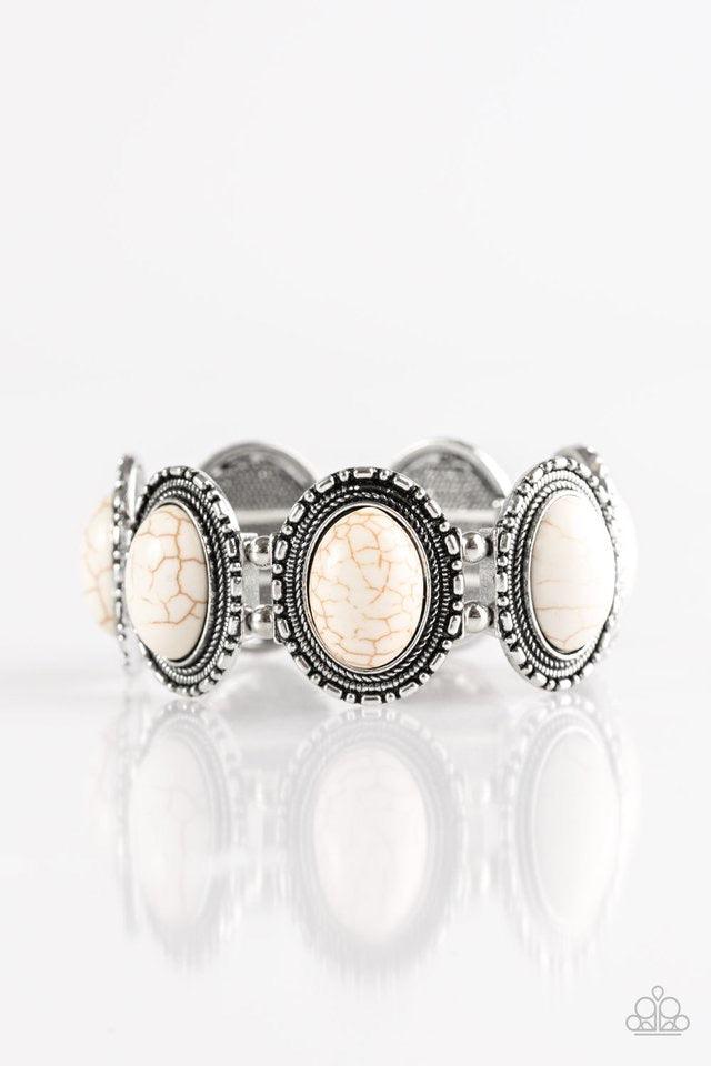 Paparazzi Accessories RANCH Out - White Smooth white stones are pressed into antiqued silver frames. Threaded along stretchy elastic bands, the earthy frames link around the wrist in a seasonal southwestern fashion. Sold as one individual bracelet. Jewelr