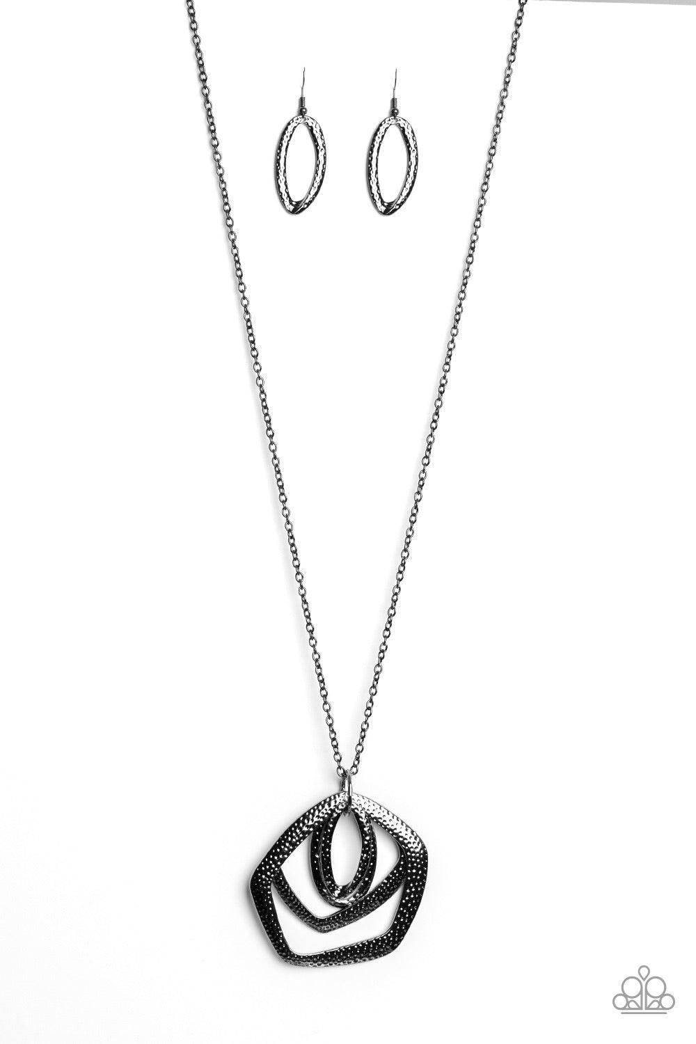 Paparazzi Accessories Urban Artisan ~Black A collection of hammered geometric frames swing from the bottom of a lengthened gunmetal chain, creating a bold artisan inspired pendant. Features an adjustable clasp closure. Sold as one individual necklace. Inc