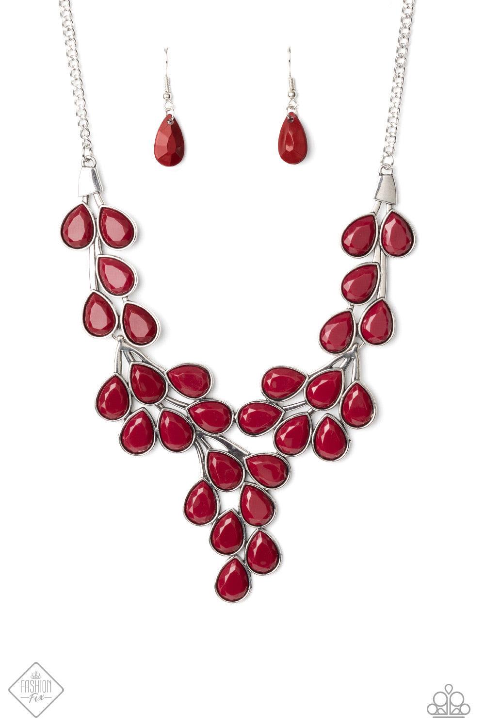 Paparazzi Accessories Eden Deity - Red Teardrop shaped beads in the deep, rich shade of Wine are encased in sleek silver frames and clustered together in vine-like patterns. The faceted edges of the beads catch the light as they branch out below the colla