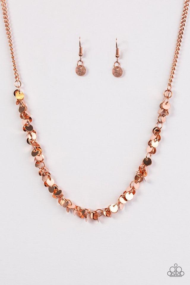 Paparazzi Accessories Year To Shimmer ~Copper Dainty shiny copper discs trickle below the collar, creating a flirty fringe. The flat shiny discs catch and reflect the light, creating playful movement across the chest. Features an adjustable clasp closure.