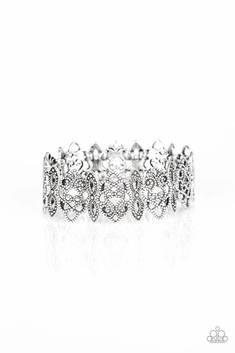 Paparazzi Accessories When Yin Met Yang - Silver Radiating with studded detail, ornate silver filigree frames are threaded along stretchy bands around the wrist for a whimsical look.Sold as one individual bracelet. Jewelry