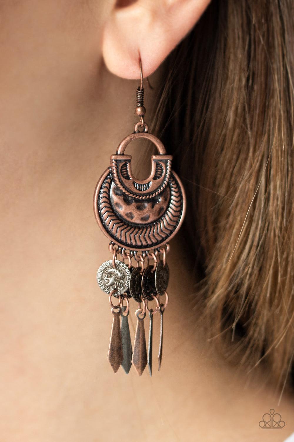 Paparazzi Accessories Give Me Liberty - Multi A shimmery collection of coin-like brass, copper, and silver discs and flared bars dangle from the bottom of an ornately hammered and textured copper frame, creating a fearless fringe. Earring attaches to a st