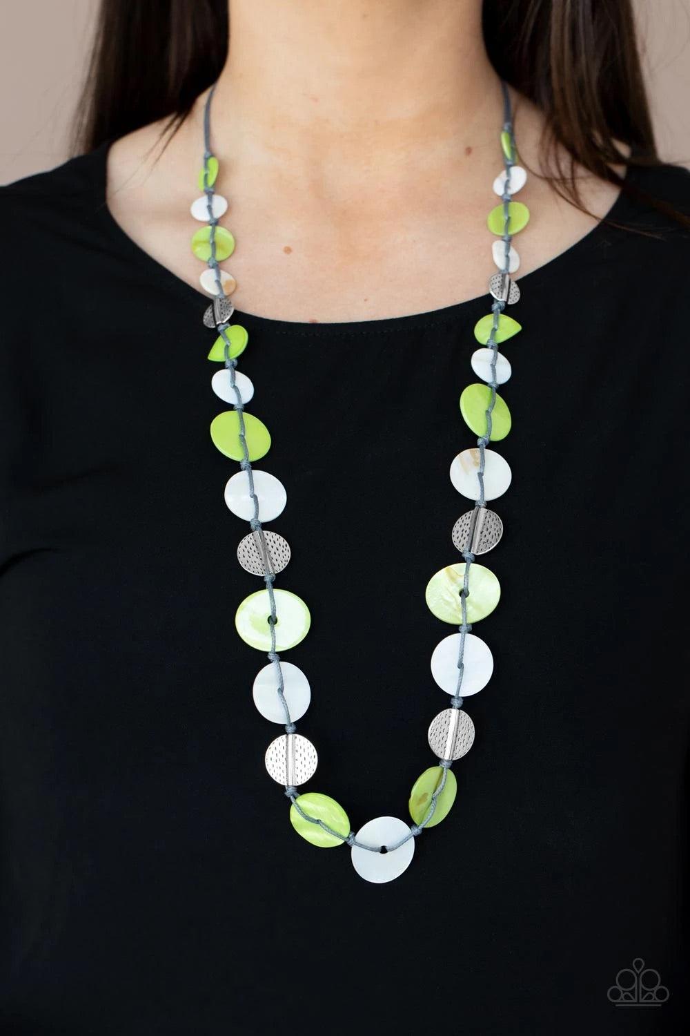 Paparazzi Accessories Seashore Spa ~Green Infused with hammered silver discs, an assortment of green and white shell-like discs are knotted in place along a gray cord, creating a summery display across the chest. Features an adjustable clasp closure. Sold