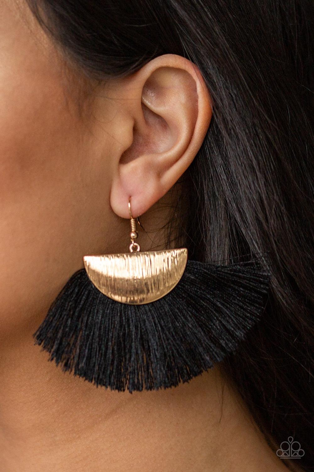 Paparazzi Accessories Fox Trap - Black A fan of shiny black thread flares out from the bottom of a shimmery gold crescent frame, creating a foxy fringe. Earring attaches to a standard fishhook fitting. Jewelry