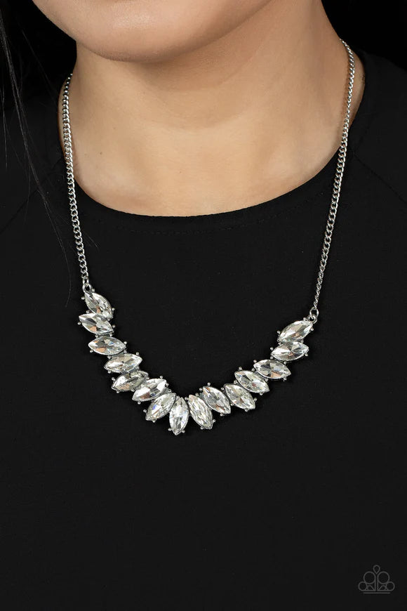 Paparazzi Accessories Galaxy Game Changer - White Featuring pronged silver fittings, a sparkly series of white marquise cut rhinestones fan out below the collar for a stellar statement-making look. Features an adjustable clasp closure. Sold as one individ