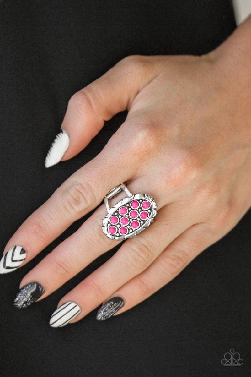 Paparazzi Accessories Cactus Garden - Pink Dainty pink stones are sprinkled across the front of a studded silver frame, creating a vivacious centerpiece atop the finger. Features a stretchy band for a flexible fit. Sold as one individual ring. Jewelry