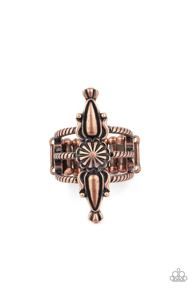 Paparazzi Accessories Westward Expansion - Copper An antiqued copper flower frame is flanked by two decorative copper teardrop frames, creating a rustic centerpiece atop three textured copper bands. Features a stretchy band for a flexible fit. Sold as one