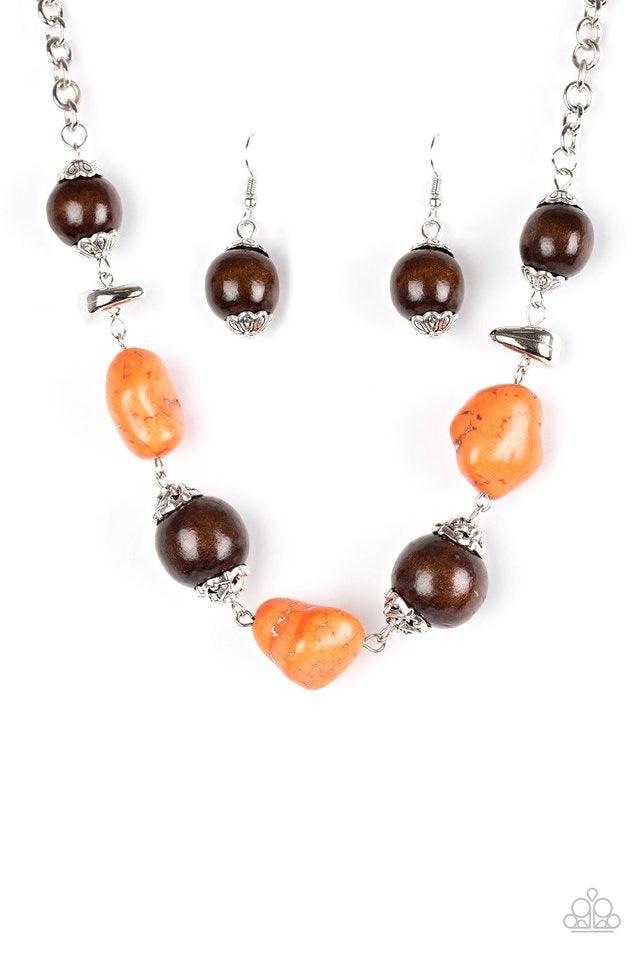 Paparazzi Accessories Earth Goddess - Orange Infused with ornate silver accents, orange stones and round wooden beads trickle along a shimmering silver chain, creating an artisanal statement piece that falls just below the collar. Features an adjustable c