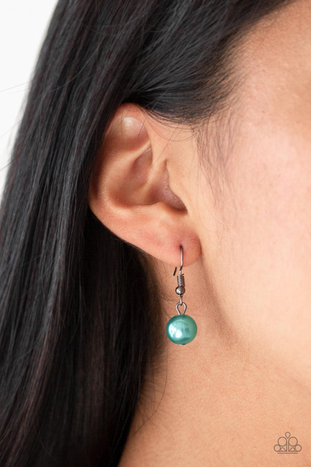 Paparazzi Accessories Color Me CEO - Blue Dusted in glitter, sparkling gunmetal and pearly Ultramarine Green beads are threaded along an invisible wire below the collar for a glamorous look. Features an adjustable clasp closure. Sold as one individual nec