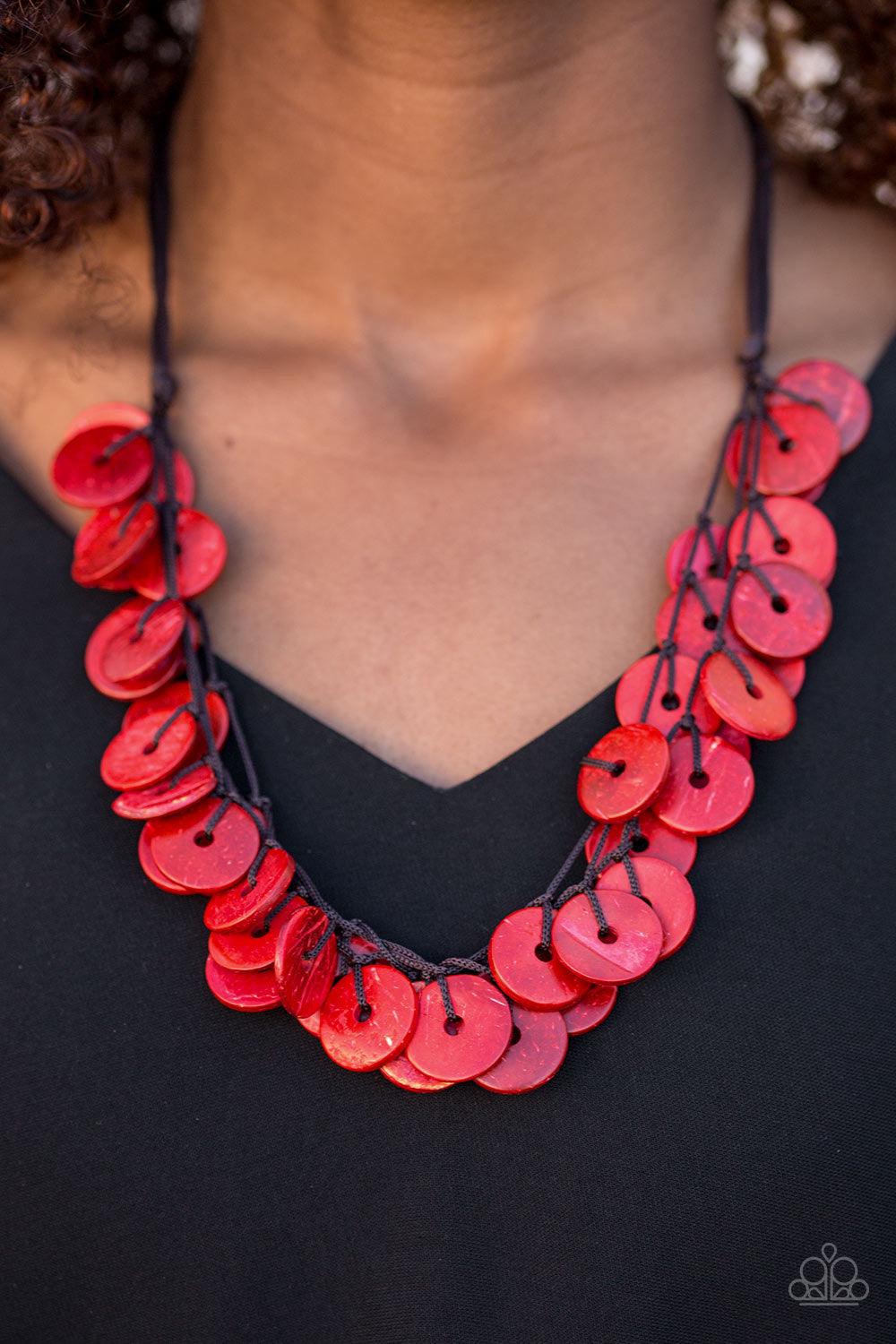 Paparazzi Accessories Jammin in Jamaica - Red Shiny wooden discs brushed in a red finish trickle along shiny brown cording, creating clustered layers below the collar. Features a button-loop closure. Sold as one individual necklace. Includes one pair of m