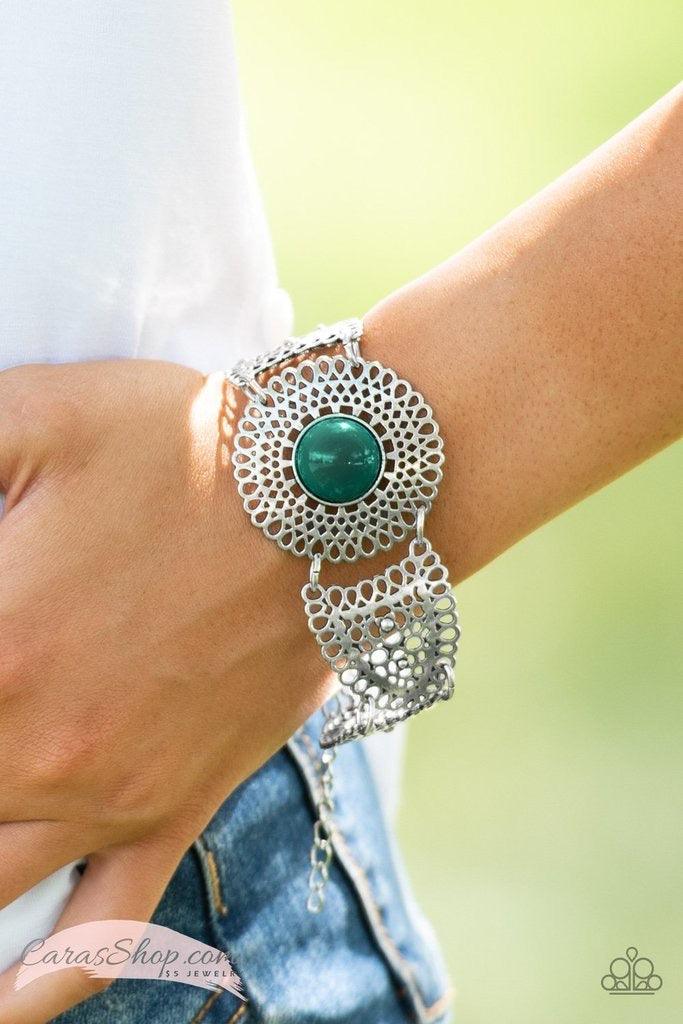 Paparazzi Accessories Avant-VANGUARD - Green Featuring lace-like patterns, stenciled silver frames connect across the wrist in a whimsical fashion. A rich Quetzal Green bead is pressed into the round center frame for a colorful seasonal finish. Features a