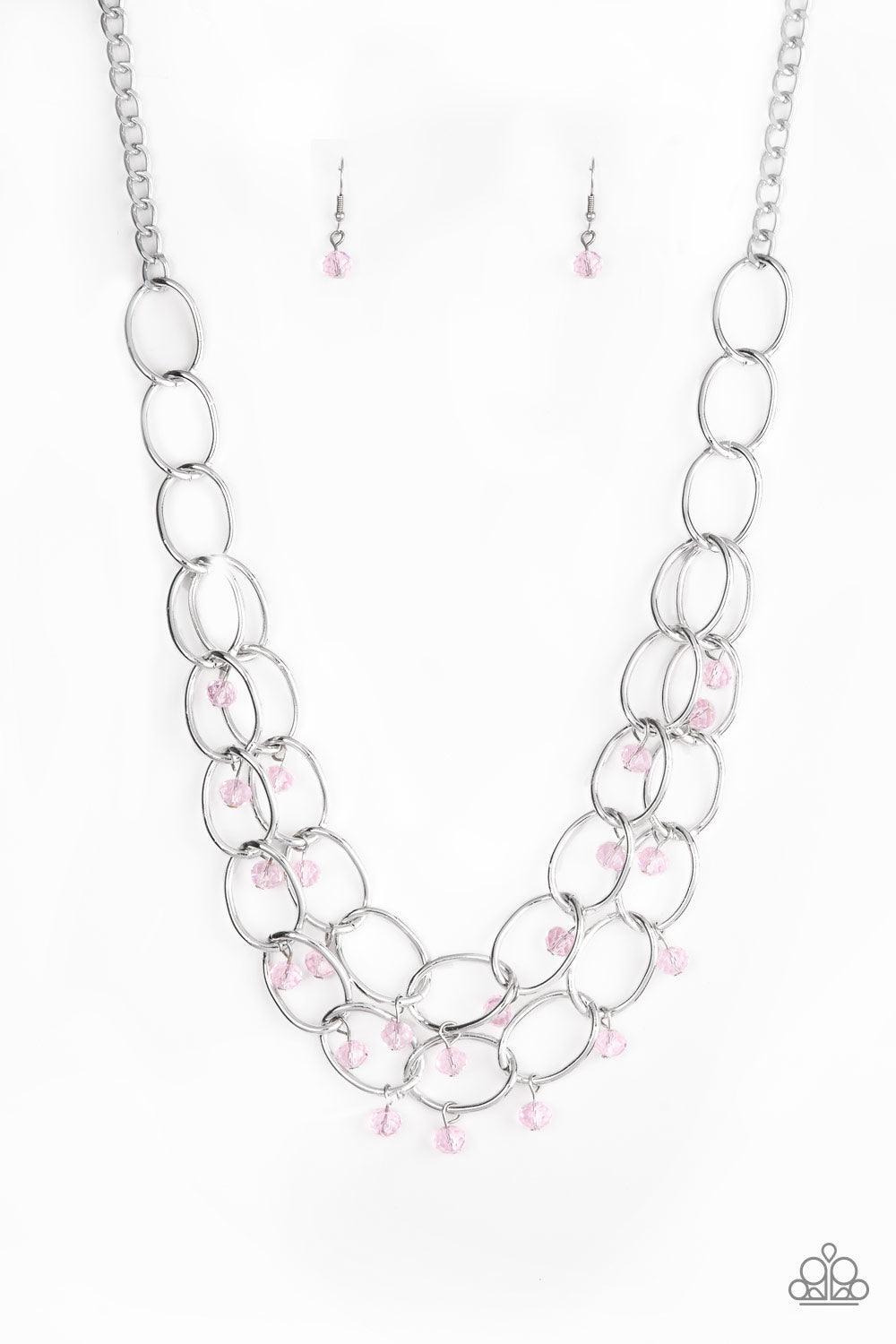 Paparazzi Accessories Yacht Tour - Pink Pink crystal-like beads swing from two layers of oversized silver links below the collar for a refined look. Features an adjustable clasp closure. Sold as one individual necklace. Includes one pair of matching earri