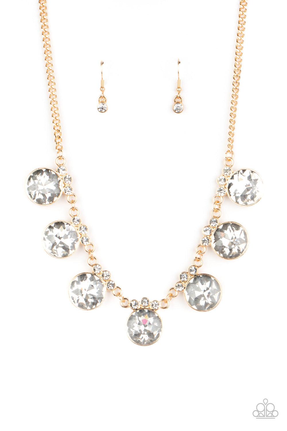 Paparazzi Accessories GLOW-Getter Glamour - Gold Crowned in a trio of dainty white rhinestones, an exaggerated display of oversized white gems delicately link below the collar for a glamorous glow. Features an adjustable clasp closure. Sold as one individ