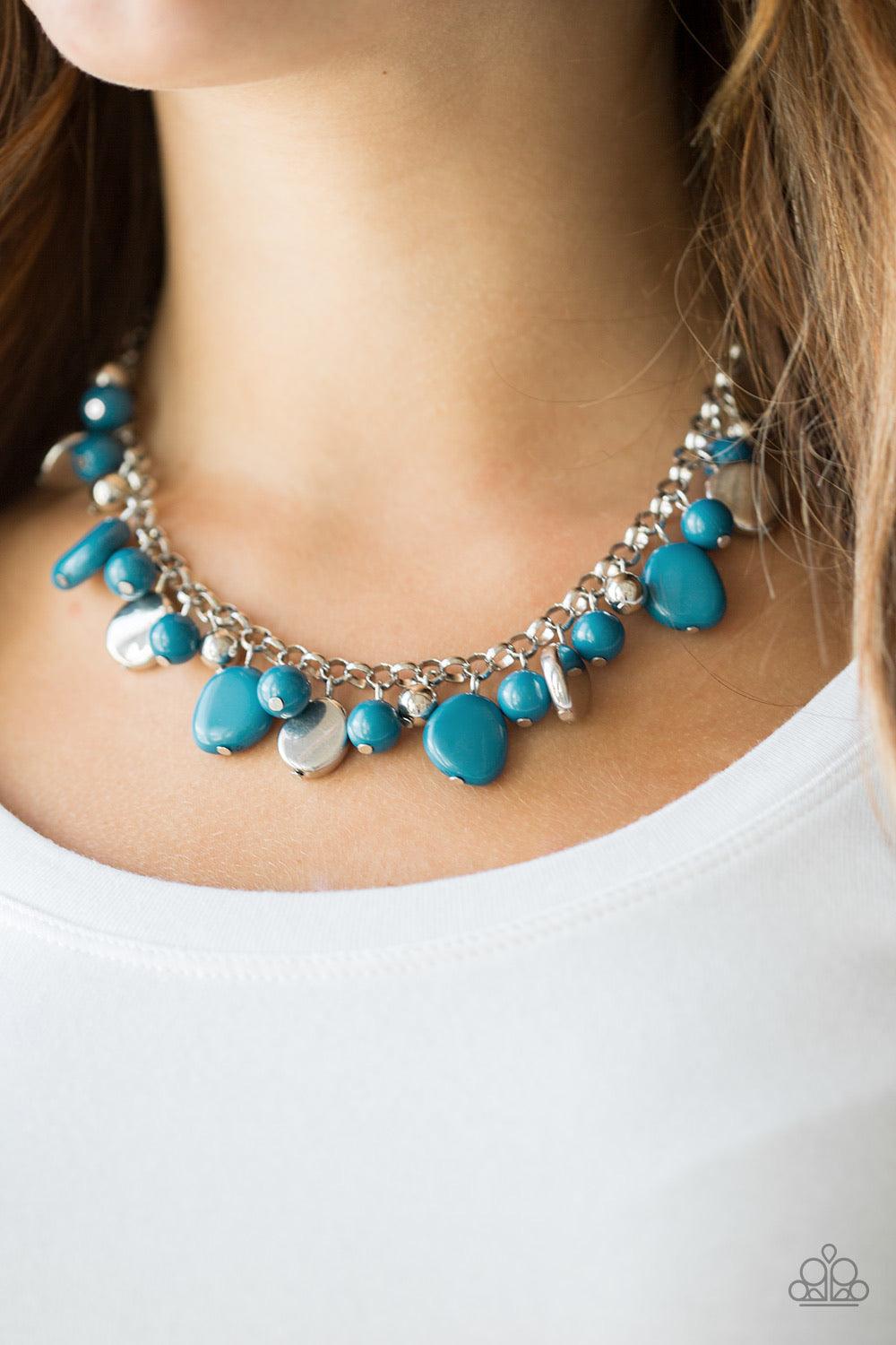 Paparazzi Accessories Flirtatiously Florida ~Blue Featuring round and asymmetrical shapes, shiny silver and blue beads swing from the bottom of a bold silver chain, creating a flirtatious fringe below the collar. Features an adjustable clasp closure. Sold