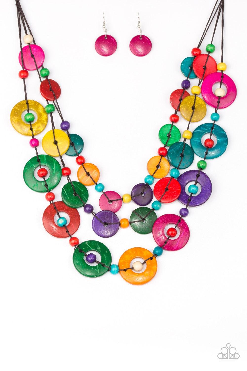 Paparazzi Accessories Catalina Coastin - Multi Brushed in a shell-like iridescence, vivacious multicolored wooden discs and round multicolored wooden beads are knotted along three strands of brown cording for a summery look. Features a button loop closure