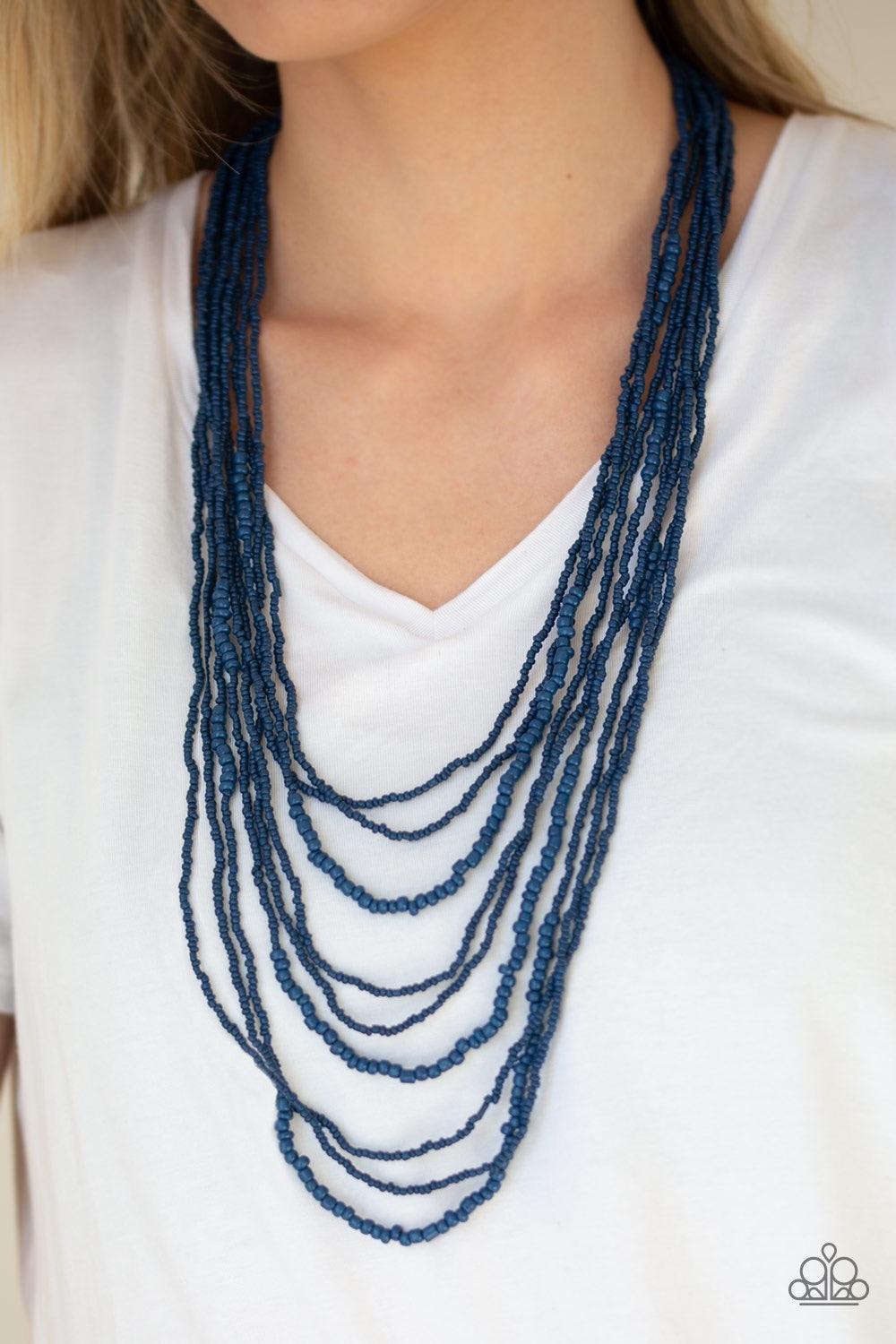 Paparazzi Accessories Totally Tonga - Blue Varying in size, row after row of shiny blue seed beads cascade down the chest, creating summery layers. Features an adjustable clasp closure. Jewelry
