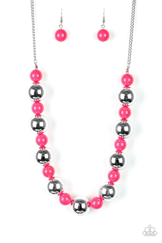 Paparazzi Accessories Top Pop - Pink Polished pink beads and dramatic silver beads drape below the collar for a perfect pop of color. Features an adjustable clasp closure. Jewelry