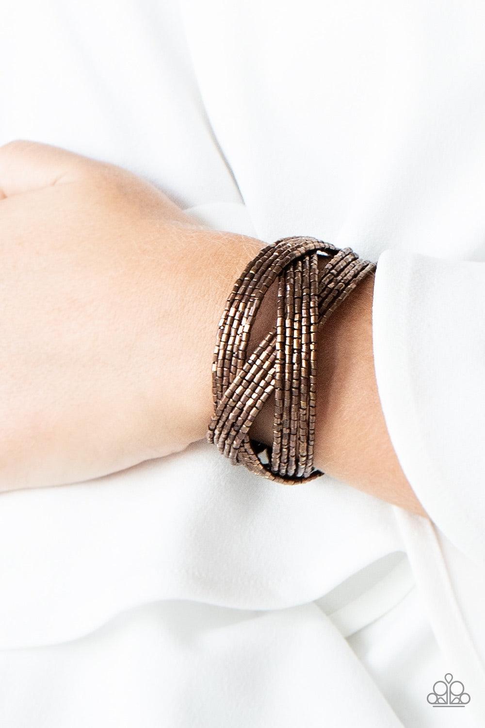 Paparazzi Accessories Shooting Stars - Copper Layers of copper seed beads are braided together to create a breathtaking cuff design that shimmers brilliantly along the wrist. Jewelry
