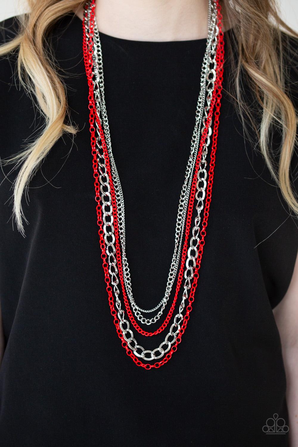 Paparazzi Accessories Industrial Vibrance - Red A collision of mismatched silver and fiery red chains layer down the chest for a colorful industrial flair. Features an adjustable clasp closure. Jewelry